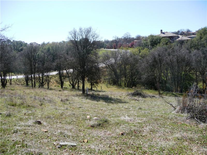 From the back of the lot looking toward Errante Drive. Walking trail is going horizontal around the middle of the picture.