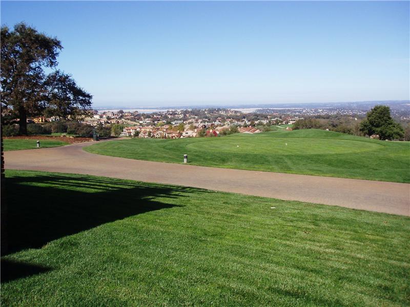 View from the golf course of Folsom Lake, Serrano homes, and El Dorado Hills